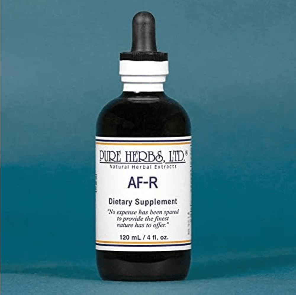 A 120 mL dark amber glass dropper bottle of Pure Herbs, Ltd. AF-R dietary supplement, featuring a white label and black dropper cap, set against a solid teal-blue background.