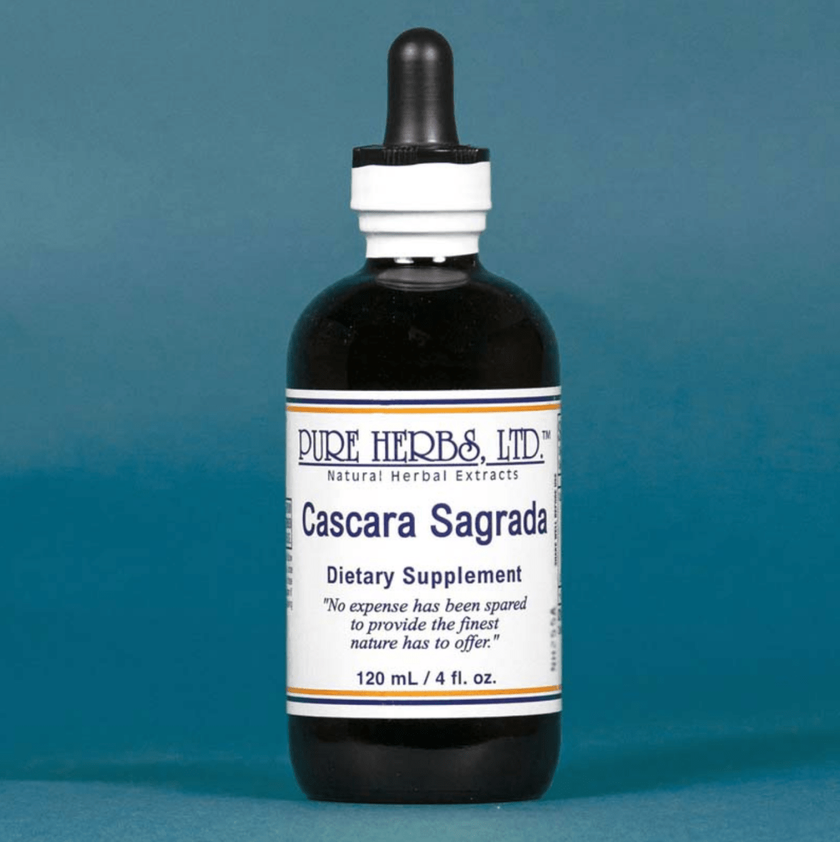 A bottle of Pure Herbs, Ltd. Cascara Sagrada dietary supplement, featuring a dark amber glass bottle with a black dropper cap and a white label, set against a solid blue background.