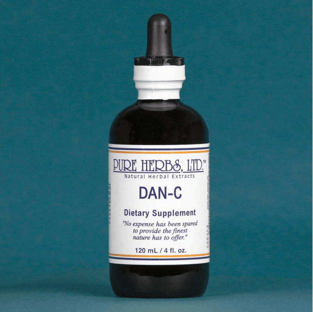 A dark amber glass dropper bottle of Pure Herbs, Ltd. DAN-C dietary supplement, featuring a white label with blue text and a black dropper cap, set against a solid teal background.