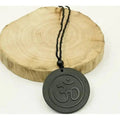 Shungite round pendant with Aum symbol engraving – EMF Protection & Energy Balancing Stone - Futures ETC